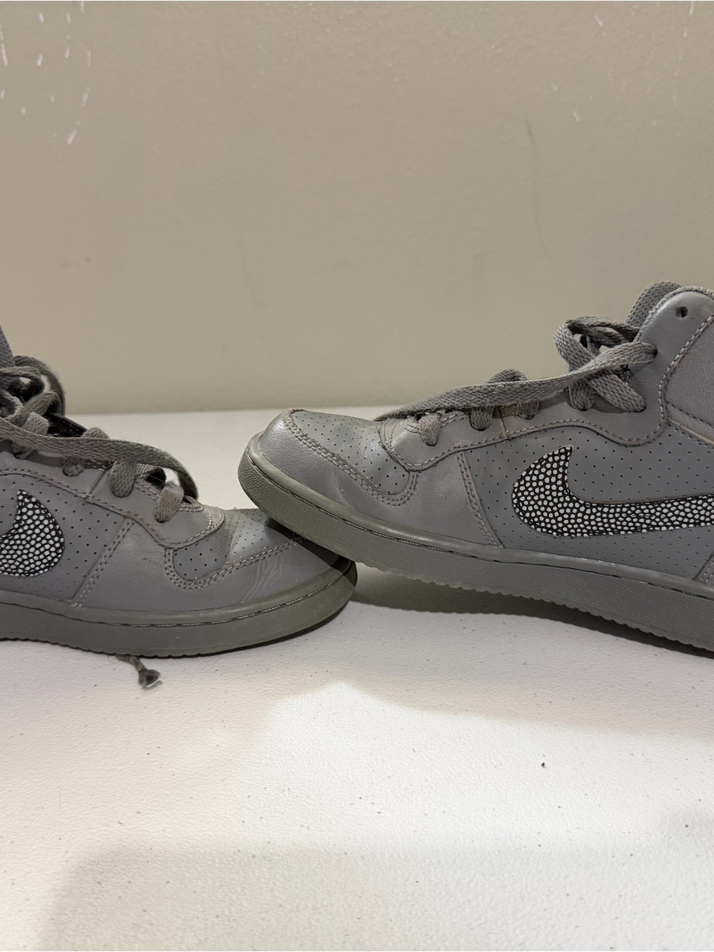 Nike Kids Gray Sneakers with Textured White-and-Black Swoosh